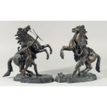 A GOOD PAIR OF BRONZE MARLEY HORSES AND ATTENDANTS. 11ins high.