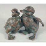 A SMALL BRONZE OF TWO CYGNETS. 4ins long.