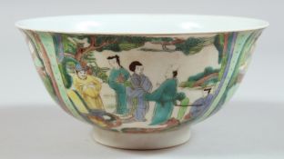 A CHINESE PORCELAIN BOWL decorated with panels of figures. 6ins diameter.