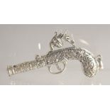 A SILVER PISTOL WHISTLE.