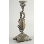 A BARBEDIENNE BRONZE STORK standing on a tortoise. 10ins high.