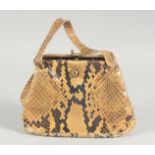 A 1940's - 1950's SNAKESKIN HANDBAG two colour, brown mounts, suede interior and two handles. 6ins