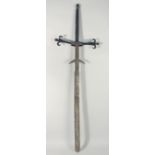 A LARGE RARE 16TH - 17TH CENTURY GERMAN LONG SWORD with leather handle. 55ins long.