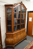 A GOOD 18TH CENTURY DUTCH MARQUETRY BOMBAY VITRINE with a pair of doors above three long drawers.