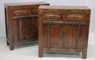 A PAIR OF LATE 19TH CENTURY/EARLY 20TH CENTURY CHINESE SOFTWOOD CABINETS with a pair of short