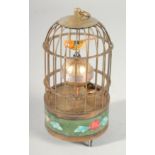 A SMALL CLOISONNE BIRD CAGE CLOCK 5.5ins high.