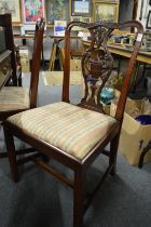 A GOOD PAIR OF CHIPPENDALE STYLE MAHOGANY SINGLE DINING CHAIRS with carved vase back splats, drop-in
