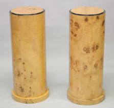 A PAIR OF ART DECO STYLE CYLINDRICAL PEDESTALS. 2ft 7ins high x 1ft diameter.