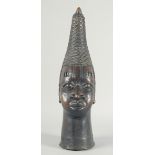 A VERY GOOD EARLY BENIN BRONZE HEAD with cross stitch and painted head 21ins high.