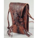 A RARE ALLIGATOR SKIN HANDBAG with two handles, the flap with a small head, with fitted interior and