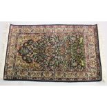 A GOOD SMALL PERSIAN RUG SHIRVAN OR ISFAHAN, dark blue ground with deer and exotic birds amongst