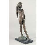 A GOOD BRONZE STANDING FEMALE NUDE Signed on a marble base.