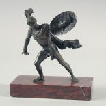 AN EARLY STANDING BRONZE OF A GLADIATOR. 5ins high on a marble base.