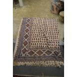 A large Eastern textile throw or wall hanging.