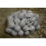 A bag of fifty Top Flite golf balls.