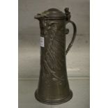 A large Continental pewter lidded ewer or flagon.