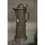 A large Continental pewter lidded ewer or flagon.