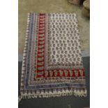 A large Eastern textile throw or wall hanging.
