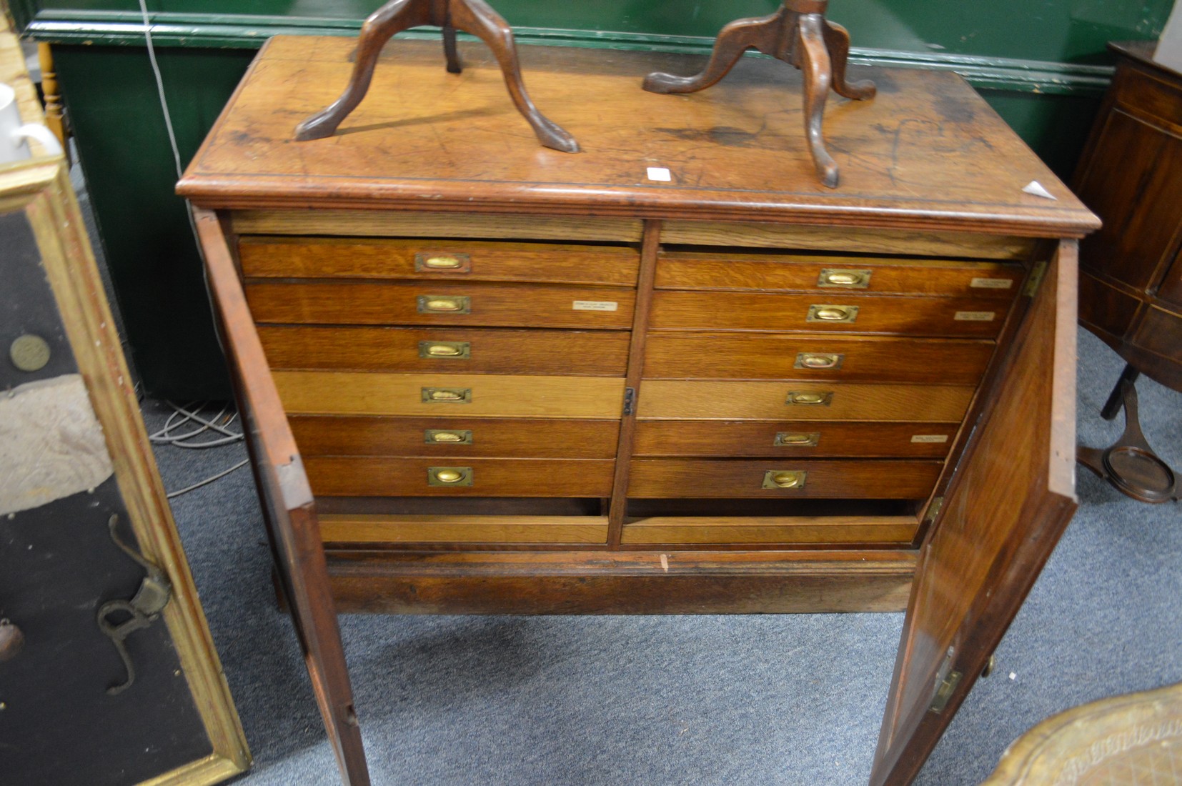 A 19th century mahogany two door collectors' cabinets.