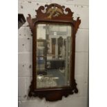 A Georgian style mahogany fretwork framed wall mirror.