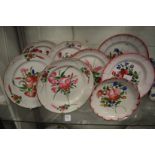 Eight Continental floral decorated plates.
