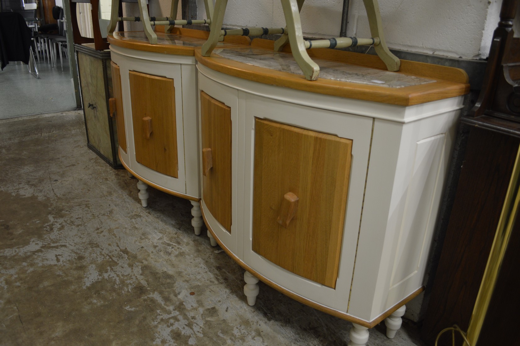 A pair of modern oak and painted cupboards.