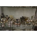 A quantity of plated items to include decanter coaster, cocktail shaker, sauceboats etc.