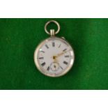 A Ladies silver cased fob watch with enamel dial.