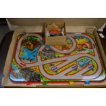 A painted tin plate racing car game, in original box.