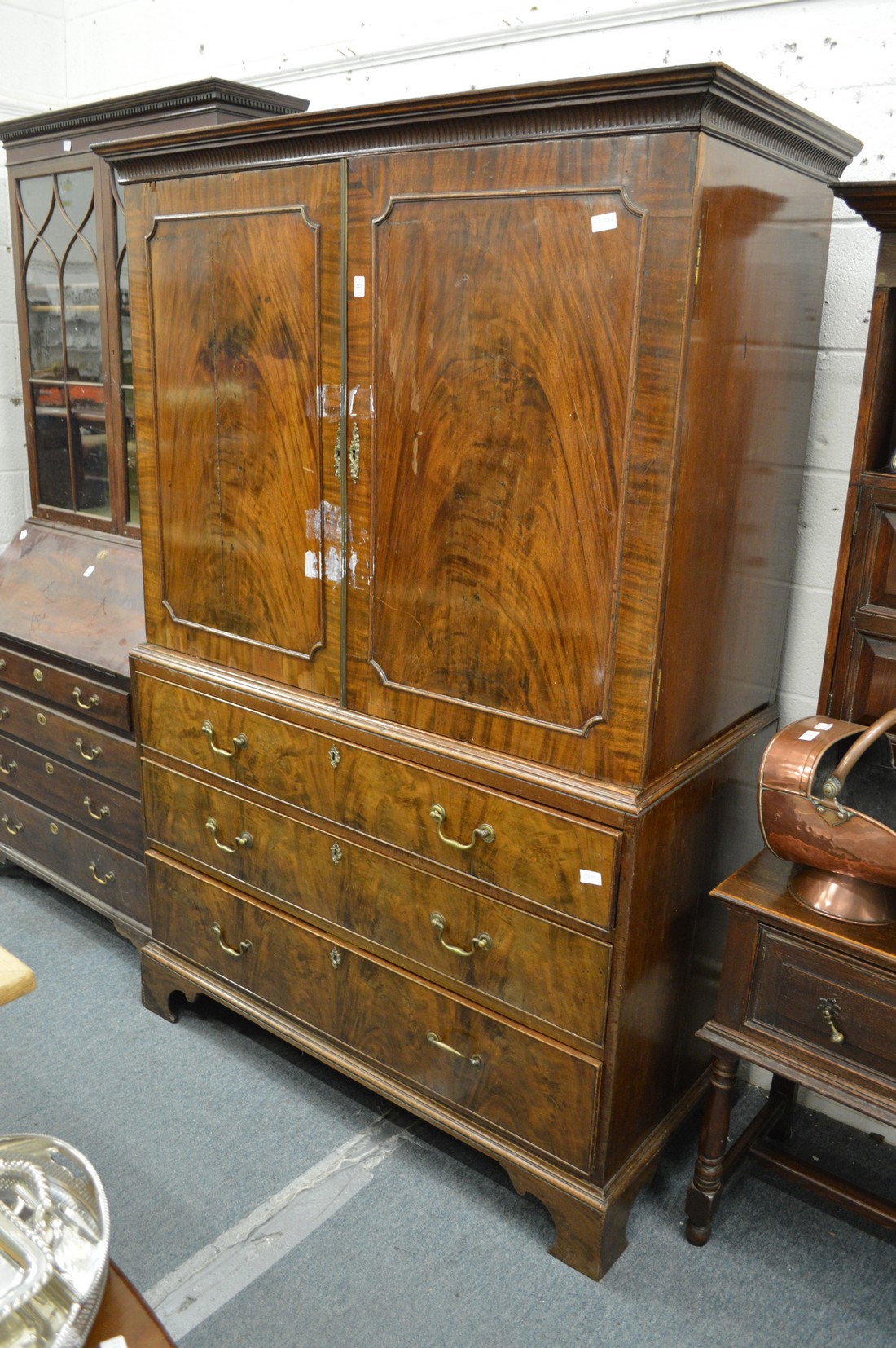 A George III mahogany linen press.