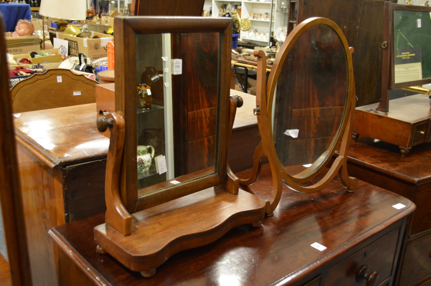 Two mahogany dressing table mirrors.