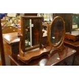 Two mahogany dressing table mirrors.