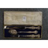 A Continental knife, fork and spoon set in a decorative fitted case.