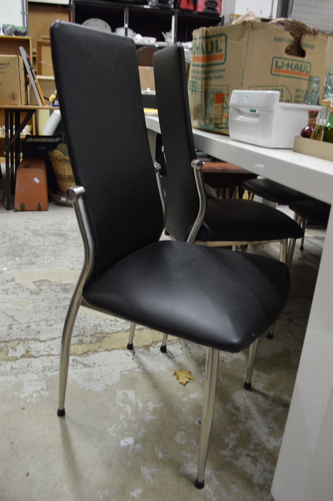 A modern white lacquer table and six dining chairs. - Image 2 of 2