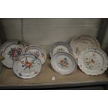 A group of Continental floral decorated plates and dishes.