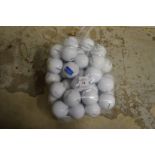 A bag of fifty Titleist golf balls.