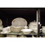 A large quantity of Royal Worcester dinner and coffee services all decorated with pears and plums.