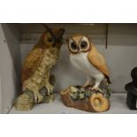 A Royal Crown Derby model of a barn owl and another model of a owl.