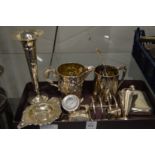 A good collection of small silverware to include a small hip flask, engraved tankard, toast rack,