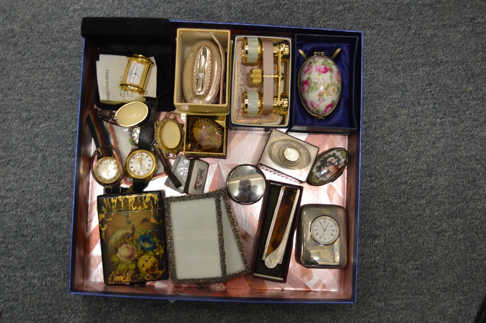 Wrist watches, decorative card case, opera glasses and other collectables.