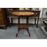 A Victorian walnut octagonal shaped centre table.