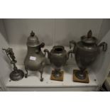 Various pewter urns and other items.