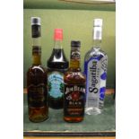 Four various bottles of drink to include Jim Beam Black.