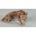 A JAY PAINTED METAL TIGER 7ins long.