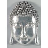 A SILVERED WALL BUDDHA HEAD 24ins long.