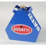 A REPLICA BLUE BUGATTI OIL CAN.