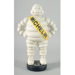 A LARGE PAINTED METAL MICHELIN MAN. 15ins high.