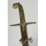 A MAMELUKE BRASS HILTED SABRE bejeweled brass scabbard.