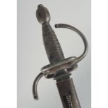 A MILITARY BROAD SWORD with "S" shaped guard and fluted pommel. SIGNED in a black leather scabbard.