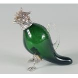 A SMALL GREEN GLASS AND PLATED COCKATOO CLARET JUG. 6ins high.